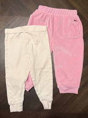 Pink corduroy pants and cream pants
